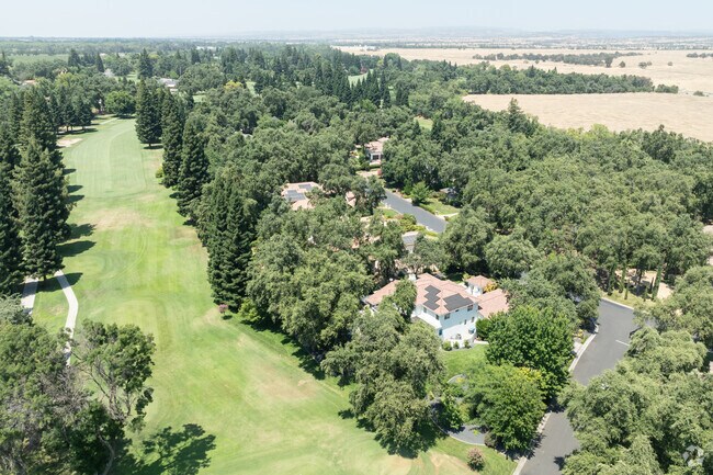 The gated neighborhood of Fairway Oaks overlooks The Butte Creek Country Club.