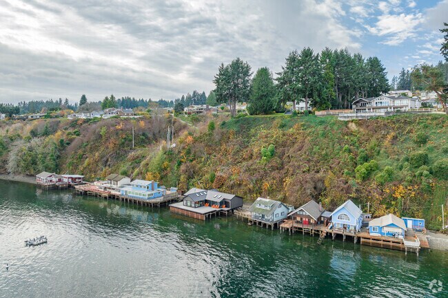 Unique beach bungalows sit directly on the water just outside Shore Acres.