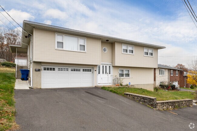 Split-level homes with garages are common in Bucks Hill.