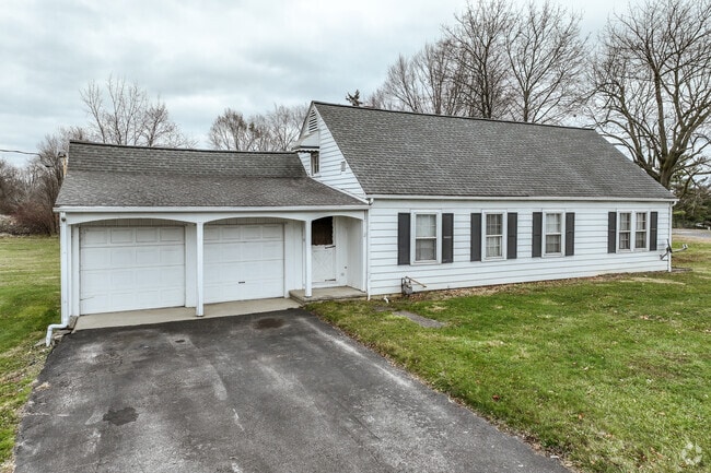 A ranch home in Troy with a two car garage.