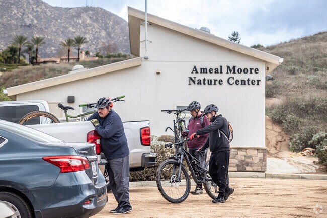 Allesandro Heights bikers mount up at the trail head near the Ameal Moore Nature Center.