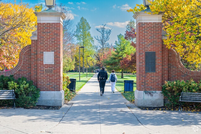 These students take advantage of one of the many walkways on Miami University's campus.