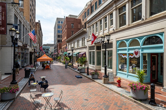 Enjoy window shopping or share a meal in the sun on Pratt Street in Downtown Hartford.