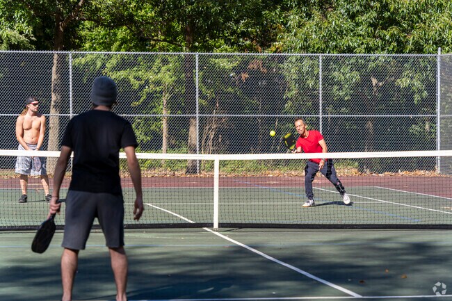 Greenleaf Manor locals play pickleball for some friendly competition.