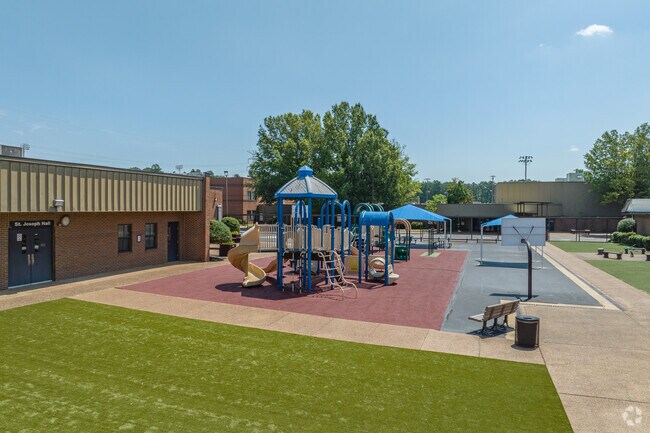 St. Francis of Assisi Catholic School has a playground with a variety of equipment.