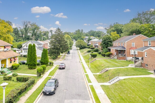Colonial and ranch-style homes are common in Windsor Hills near Leakin Park.