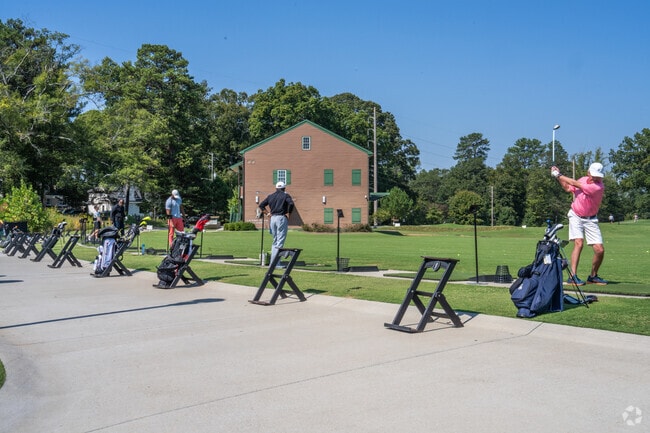 Margaret Mitchell residents take to the practice range at Bobby Jones Golf Course.