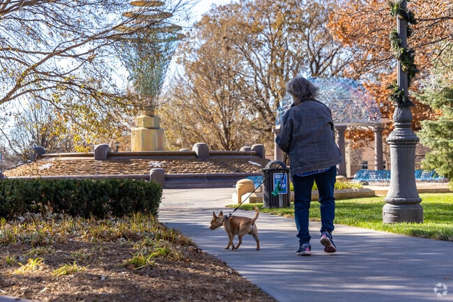 You can take your pup for a walk in Bayliss Park of Council Bluffs, IA.