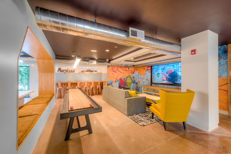 Chill lounge with shuffleboard, lounge seating and flatscreen TV