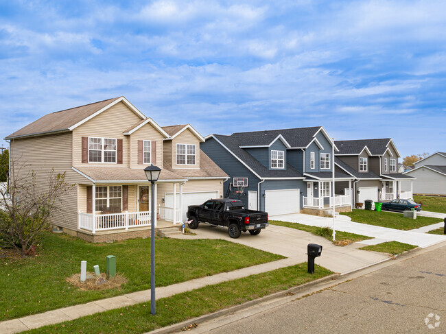 Newly built homes each have covered porches in West Park-Columbia.