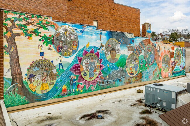 A colorful mural is painted above Pat's Pub in Apollo, PA.