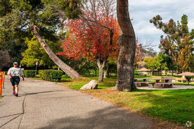 Bonelli Regional Park offers trails and lake access near Ganesha.