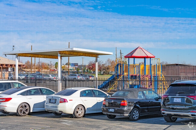 Kids love the play structure at New Testament Christian School.