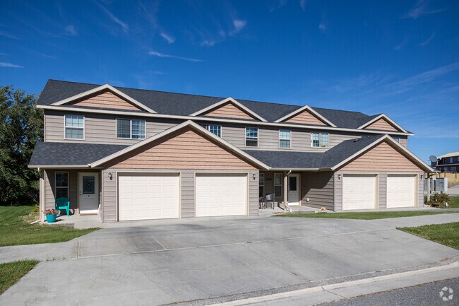 Apartment homes with a tidy lawn in South East Helena.