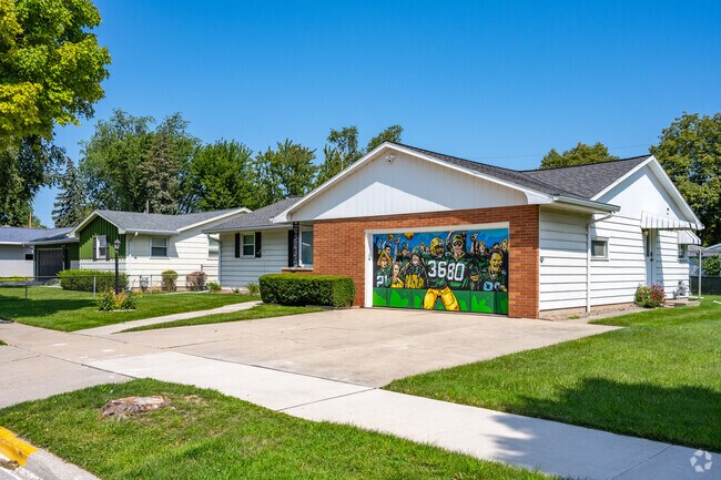 Houses throughout the Lombardi neighborhood show off their Packer Pride.