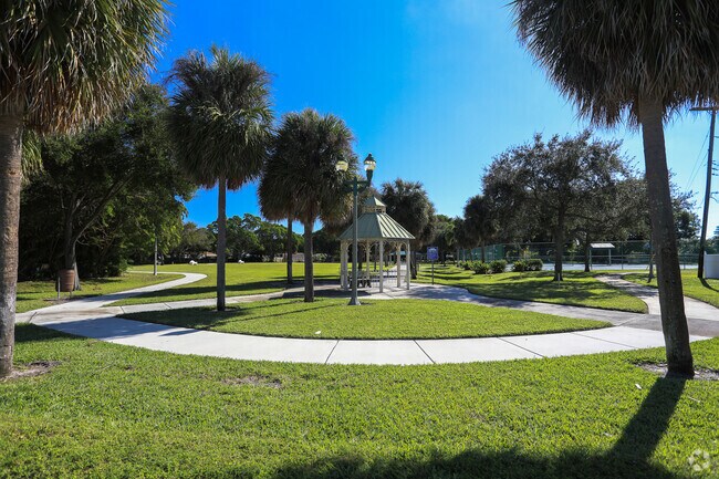 Enjoy a walk around on the paved paths of the Chillingworth Park in Palm Beach Lakes.