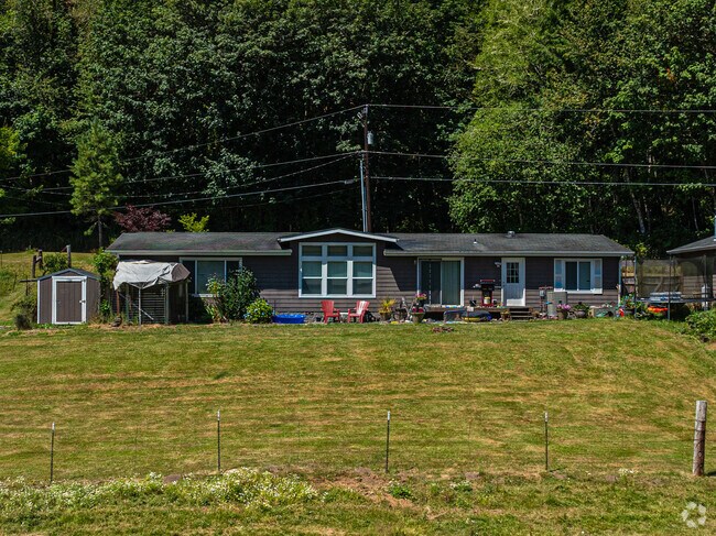 A perfectly kept rambler style home in rural Porter.