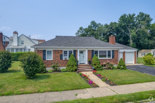 Find brick rancher style homes with well landscaped gardens in North End.