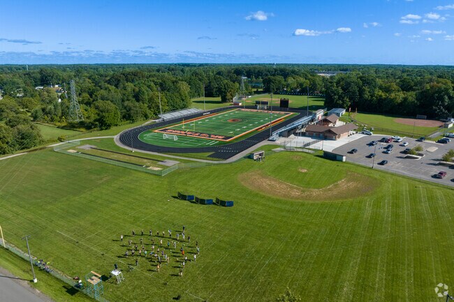 The Clio Area High School marching band practices on the field in Clio.