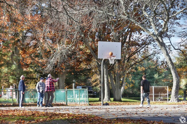 Challenge friends to a game of basketball on the courts in Valley Stream State Park.