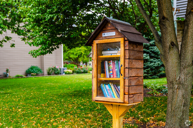 Exchange books at one of the little free libraries found around Briarcliff Woods.