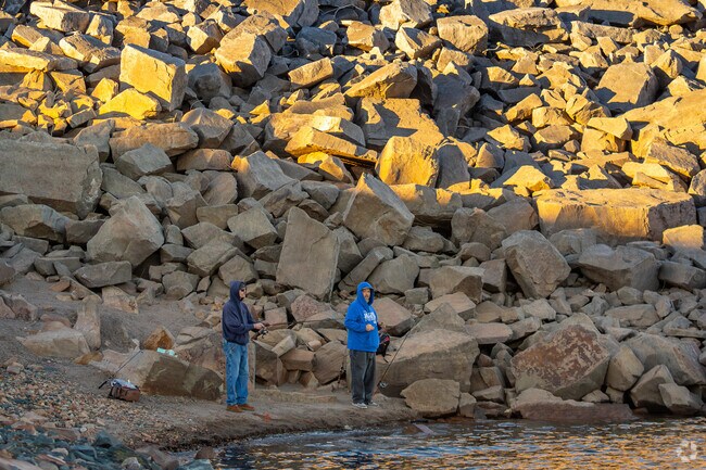 Spend time fishing with your best friend at Horsetooth Reservoir.