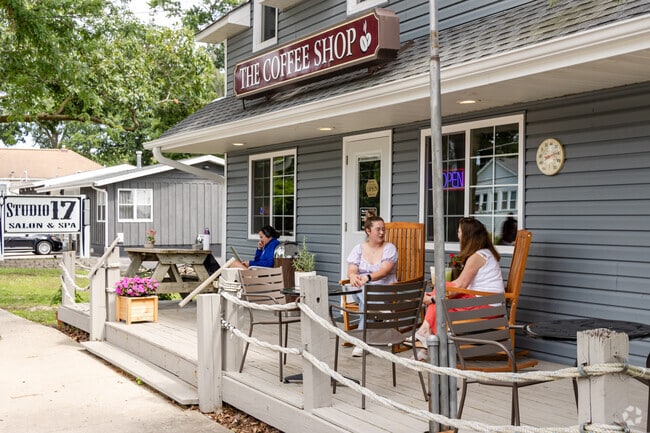Residents of West Palm Beach are enjoying the quaint porch seating at The Coffee Shop.