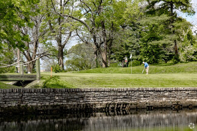 Tates Creek residents enjoy the picturesque green on the 17th green at Tates Creek Golf Course.