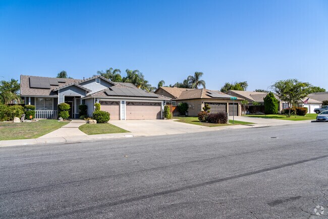 A row of single-family ranch-style homes, embodying the essence of Crystal Ranch living.