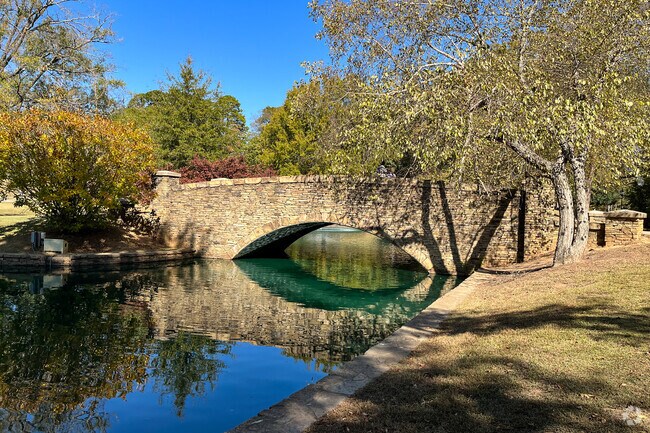 Freedom Park Bridge in Myers Park is the lover's-locks bridge.