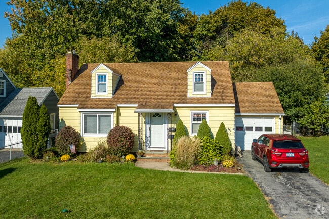 Properties are bordered by dense greenery throughout Westvale.