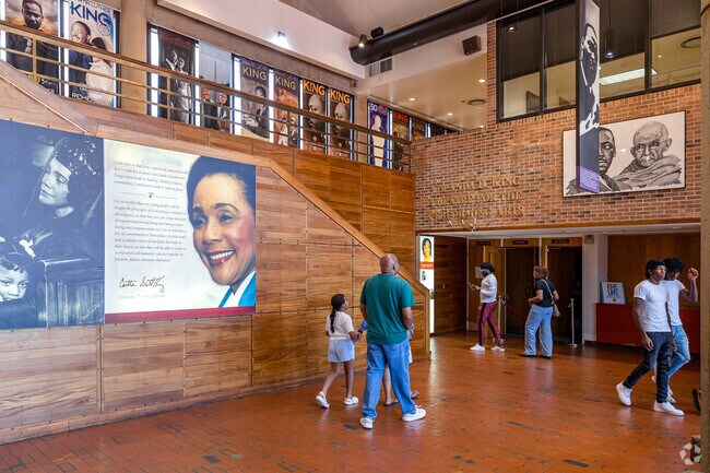 People learn about MLK Jr. inside the King Center Museum in Sweet Auburn.