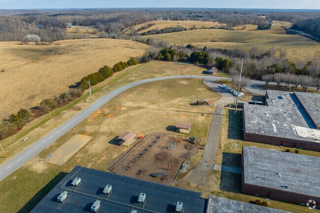 Stuart Burns Elementary School a basketball court, green space, and extra playground in Burns.