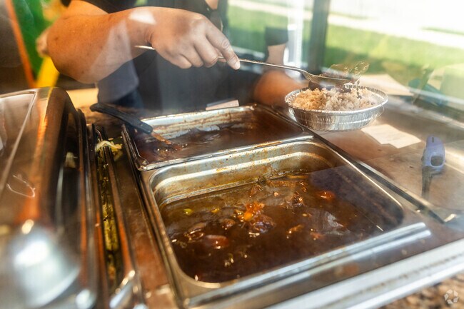 Fairland's Tropicana Eatery is well known for their jerk chicken.