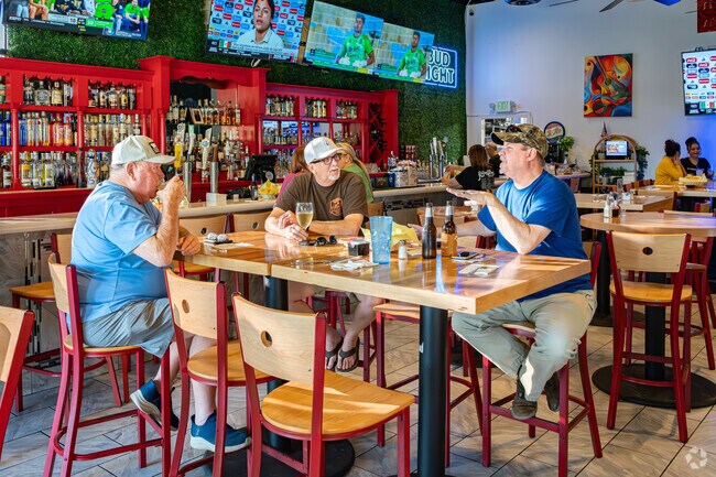Three Rosedale friends enjoy a drink at the bar of Rancho Grande Mex Grill.