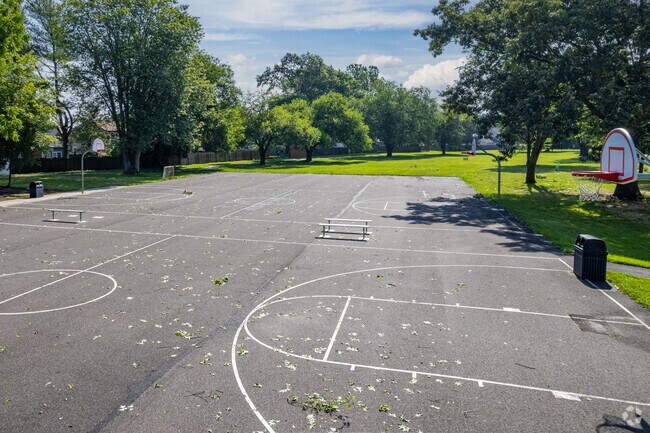 Play a game of basketball on the courts at J. Harold Van Zant School.