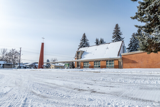 Gethsemanee Lutheran features a parking lot in front of the school.