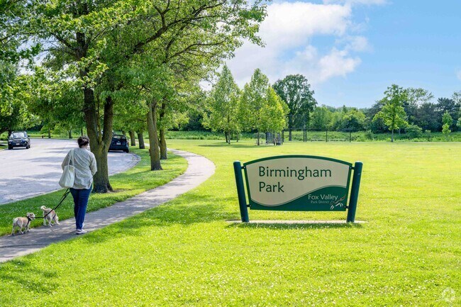 Enjoy a brisk morning walk with your furry friends at Birmingham Park in Eola Yards.