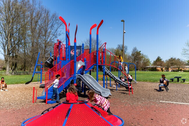 Kids can run around the Blue Jackets hockey themed playground at Barnett Community Center.