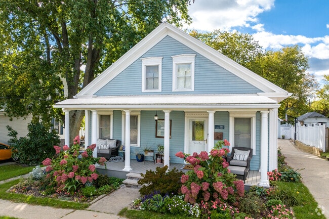Single story traditional home with porch in the Hillcrest area of Peoria, IL.