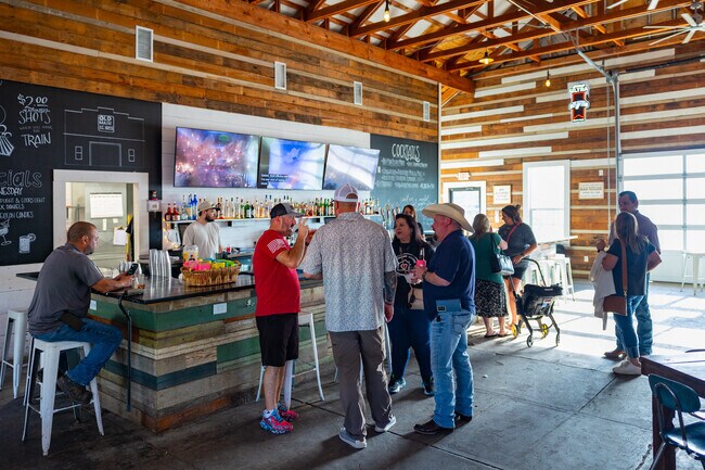 Locals of Cibolo enjoying a mjuch earned drink at the Old Main Ice House in Cibolo.