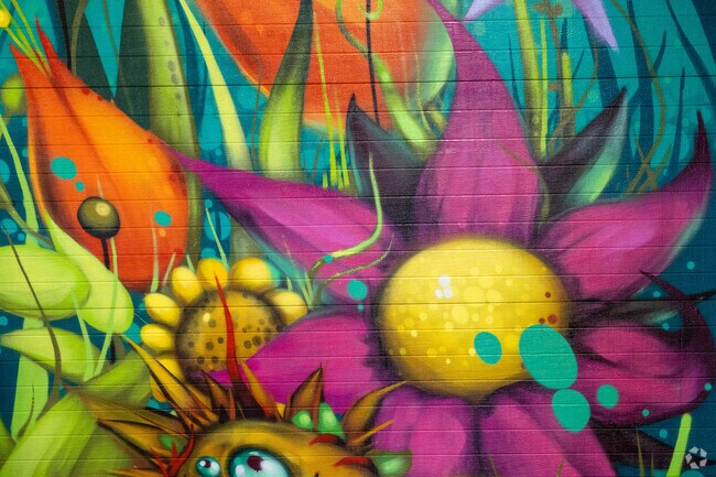 This flower mural can be found on the wall at Indoor Gardens in Rolling Acres.