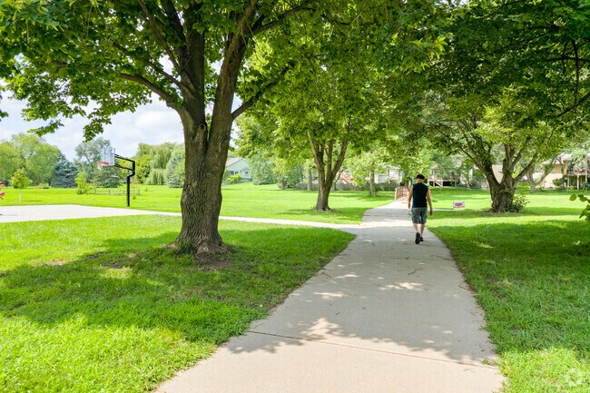 Pacific Meadows Park's paved trails are perfect for a shaded afternoon walk.