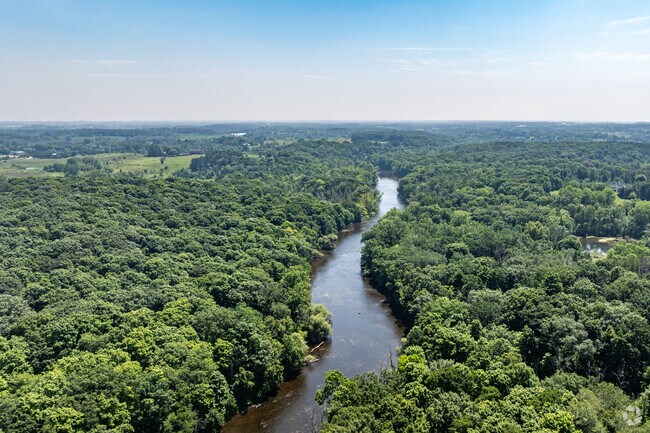 The Milwaukee River runs through the vast Marie Kraus Park in Fredonia.