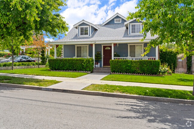 A quint home with dormer windows sits in a quiet neighborhood in Lake Elsinore.
