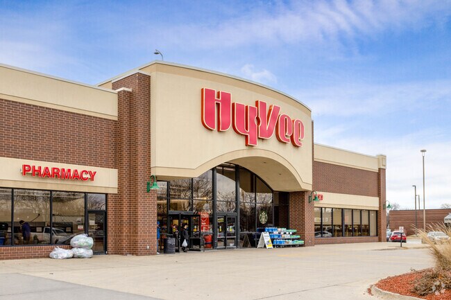 Residents grab groceries at HyVee in the Merle Hay shopping center.