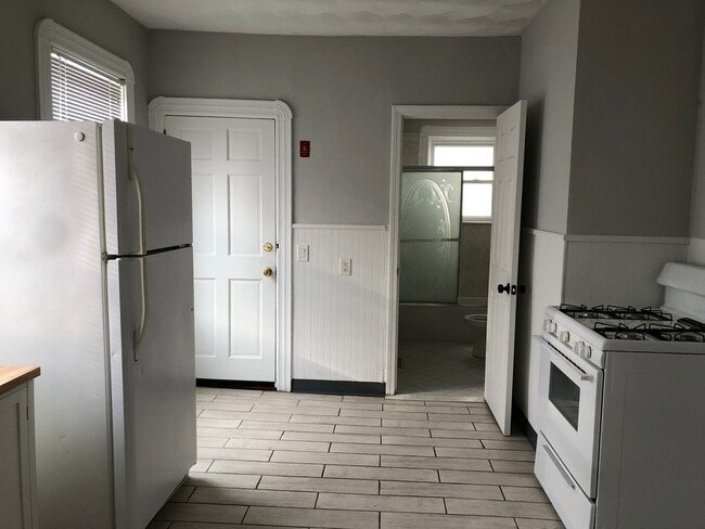 Kitchen, Rear Entrance Bathrom