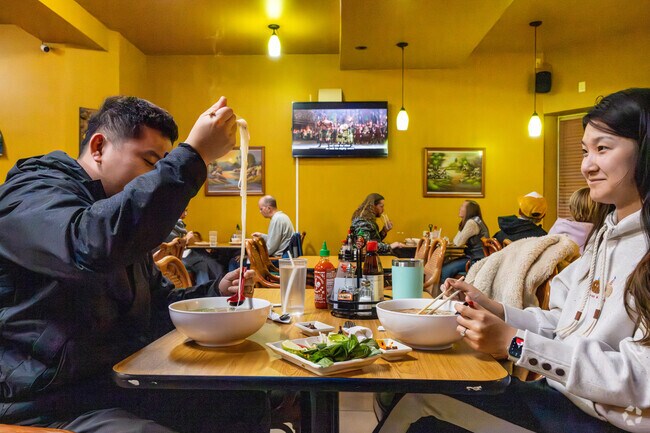 Pull up a chair for a big bowl of noodles at Thai Orchid just minutes from Eastside Hill.