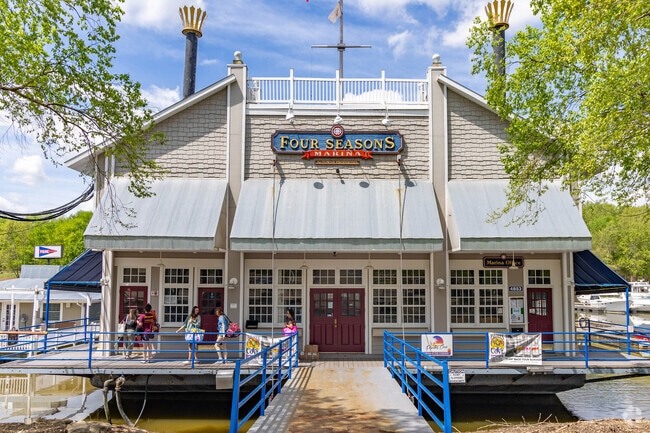 The Four Seasons features restaurants, retail shops, and a driving range in East End.