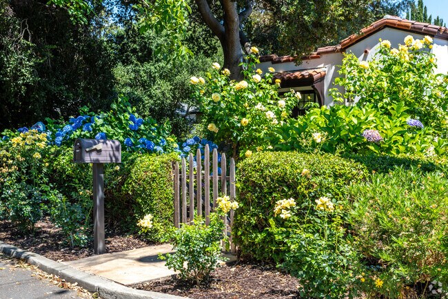 The entrance of a Spanish-style home in Downtown Menlo Park's Allied Arts District exudes charm.